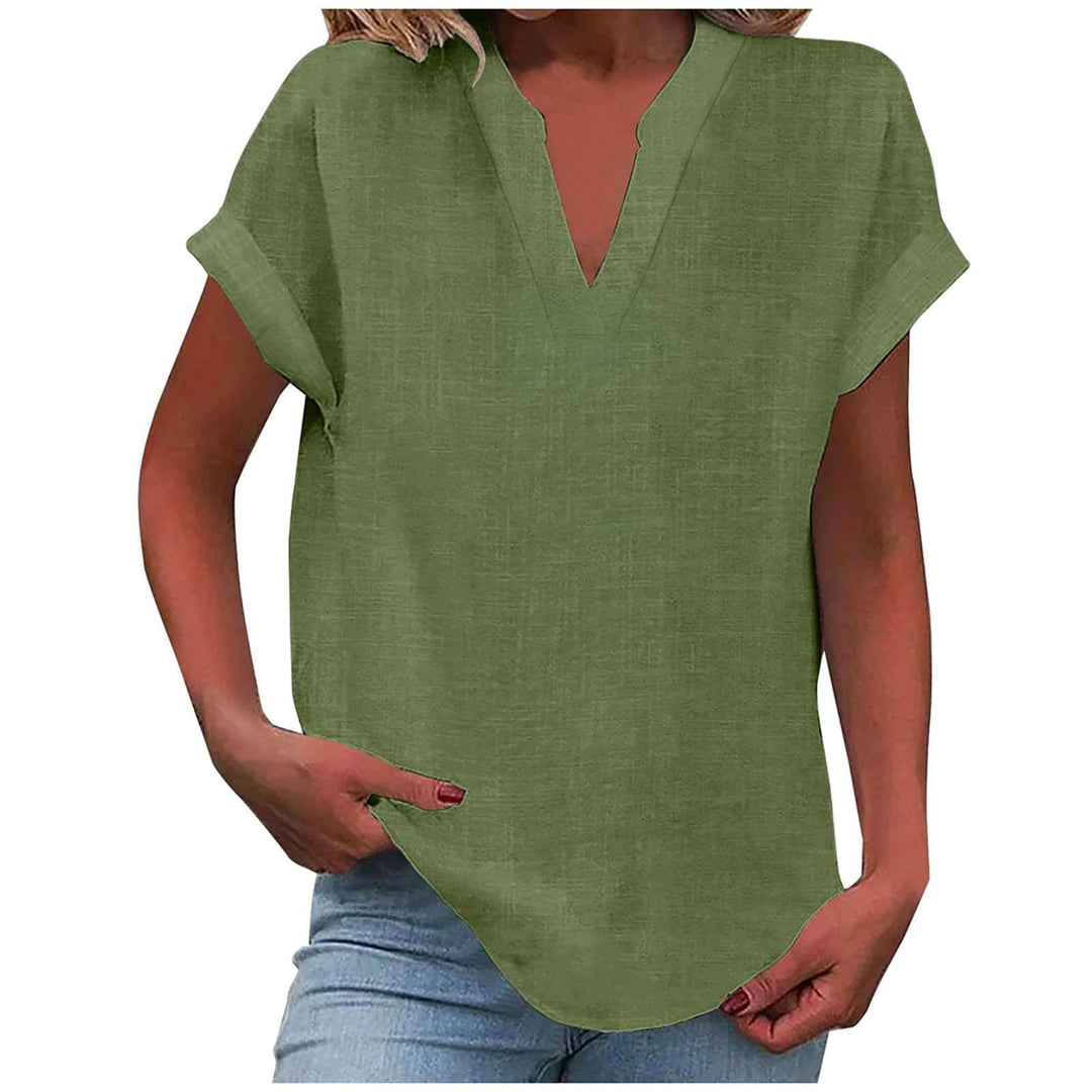 Detailed texture of soft, relaxed fit women's V-neck blouse, emphasizing fabric quality & comfort.