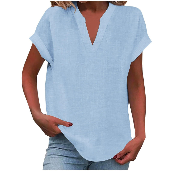 Close-up of V-neck and short sleeve of a stylish women's comfort blouse. Versatile & elegant.