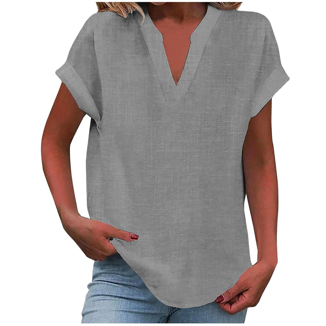 Spring/Summer women's fashion: vibrant relaxed fit V-neck blouse, a comfortable short sleeve top.