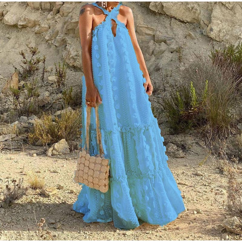 Stylish women's long flowy maxi dress for summer fashion, offering an elegant yet casual versatile style.
