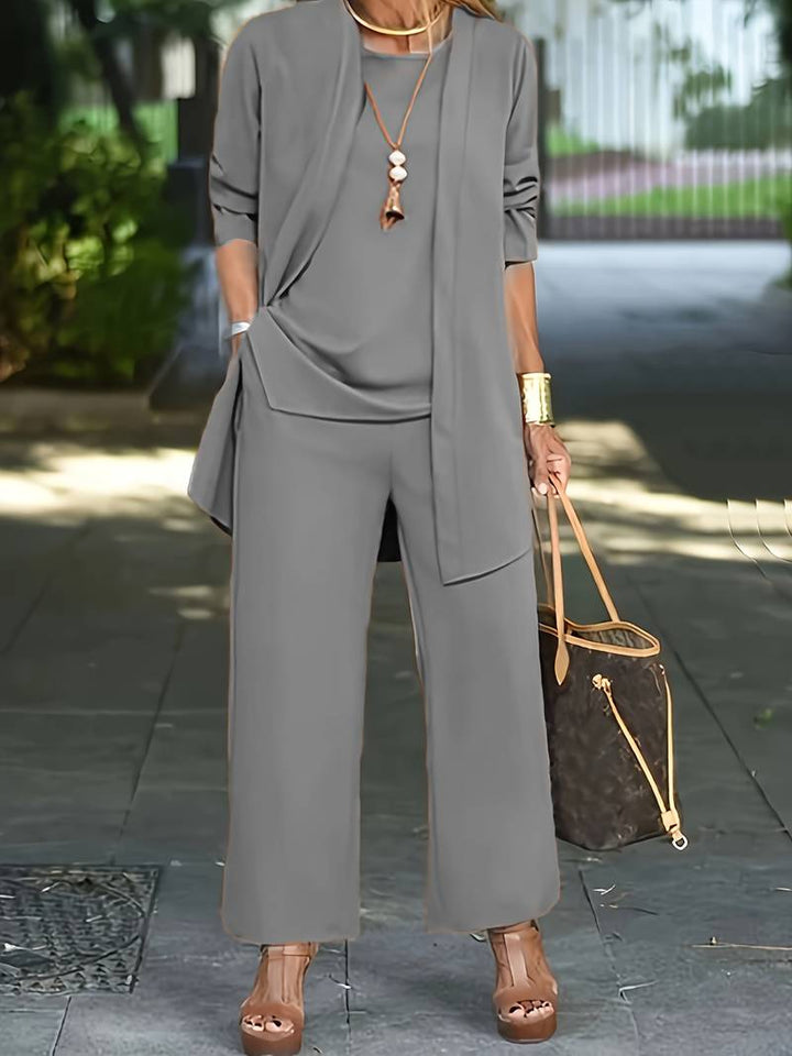 Women's 3 piece long sleeve lounge set with a round neck top and comfortable wide leg pants.