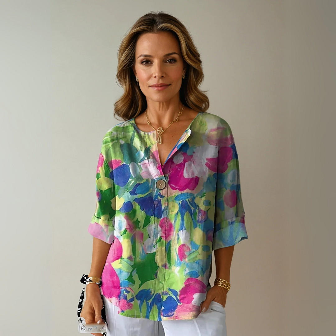 Women's elegant casual V-neck blouse, abstract floral print. Relaxed fit, 3/4 sleeve summer top for warm weather.