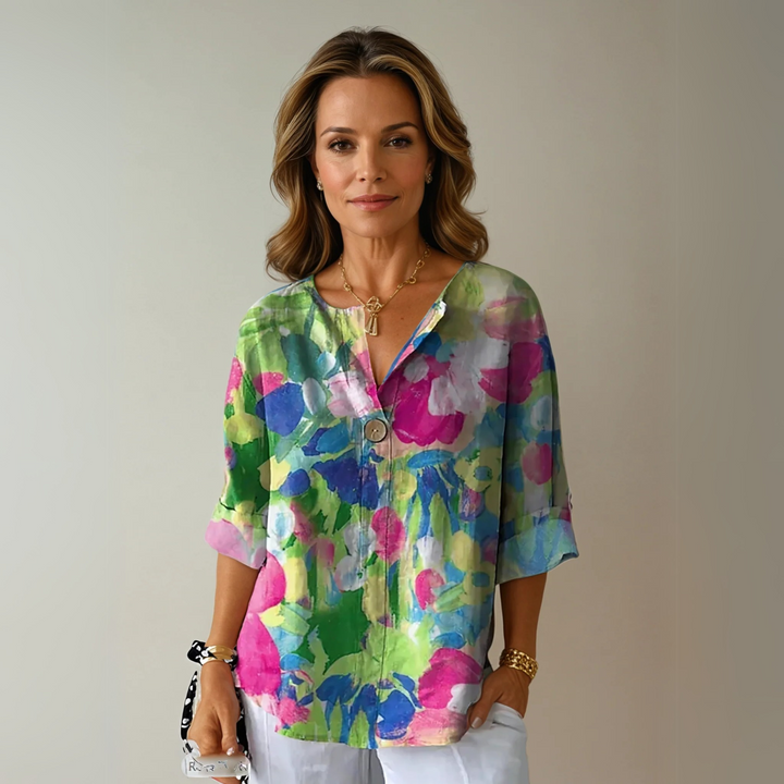 Women's elegant casual V-neck blouse, abstract floral print. Relaxed fit, 3/4 sleeve summer top for warm weather.