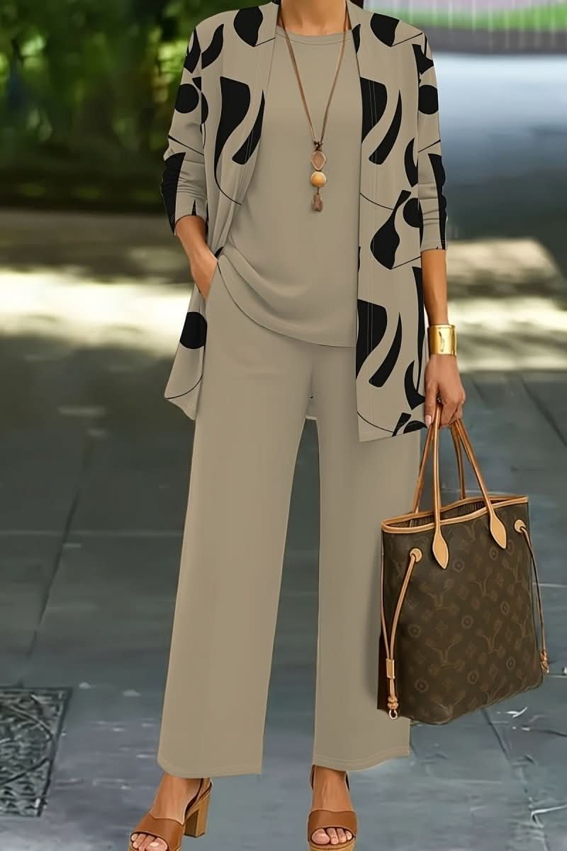 Comfortable women's abstract print 3-piece set. Versatile casual outfit for modern, stylish lounging.