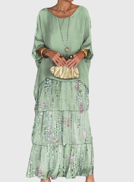Unique abstract print women's tiered maxi dress, flowy bohemian silhouette, versatile.