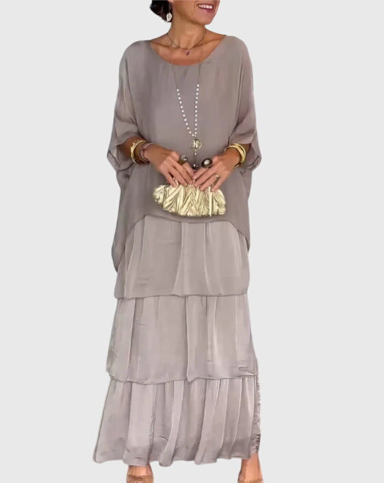 Summer vacation women's abstract print maxi dress, tiered flowy boho style, comfortable.