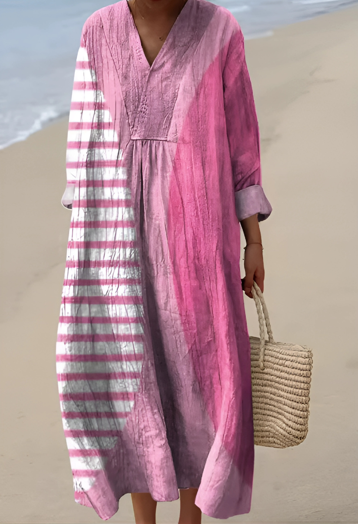 Women's abstract print V-neck midi dress, featuring an artistic design and comfortable, flowing silhouette for summer.