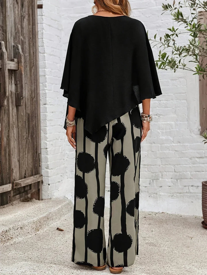 Comfortable women's abstract print batwing top & wide leg trouser set, perfect for day to night wear.