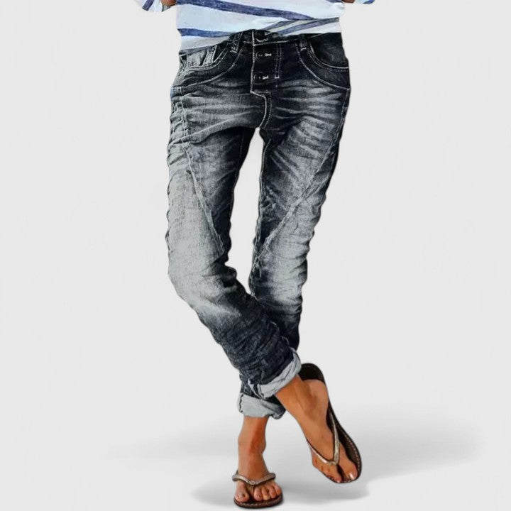 Stylish women's acid wash skinny jeans, denim, with prominent contrast stitching and a vintage feel.