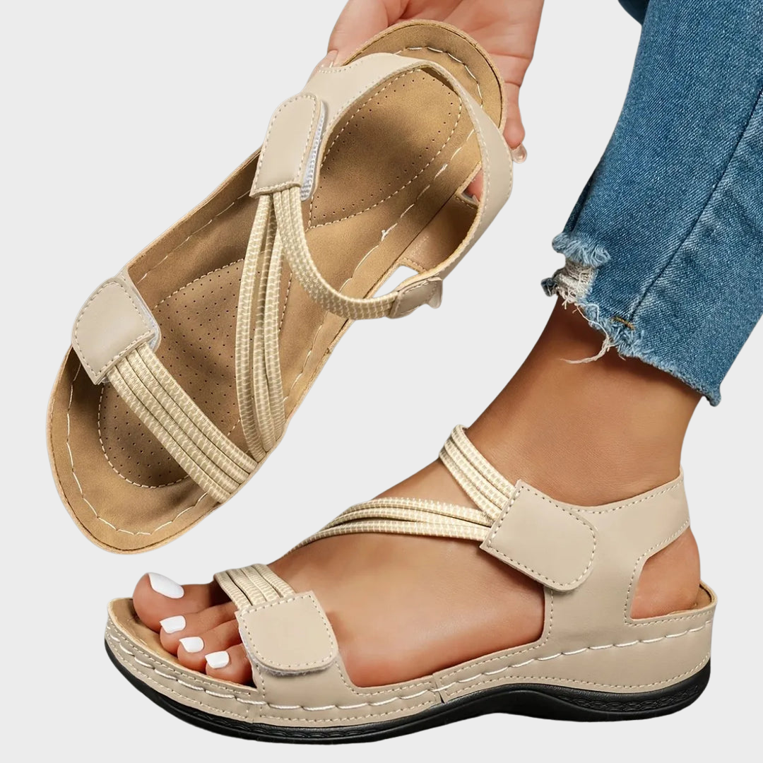 Women's adjustable comfort sandals with elastic straps & cushioned sole, perfect for summer walking.