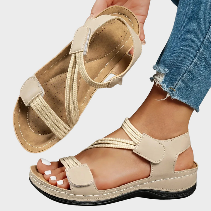 Women's adjustable comfort sandals with elastic straps & cushioned sole, perfect for summer walking.