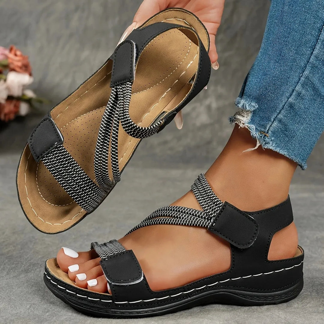 Ultra-comfortable women's sandals with soft cushioning and adjustable elastic straps for all-day wear.