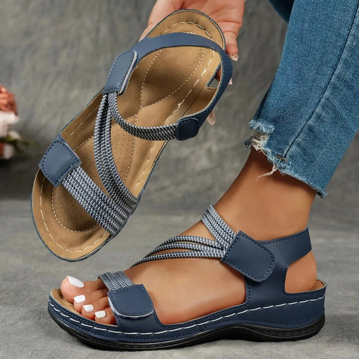 Women's cushioned comfort sandals with adjustable elastic straps, versatile summer footwear for walking.