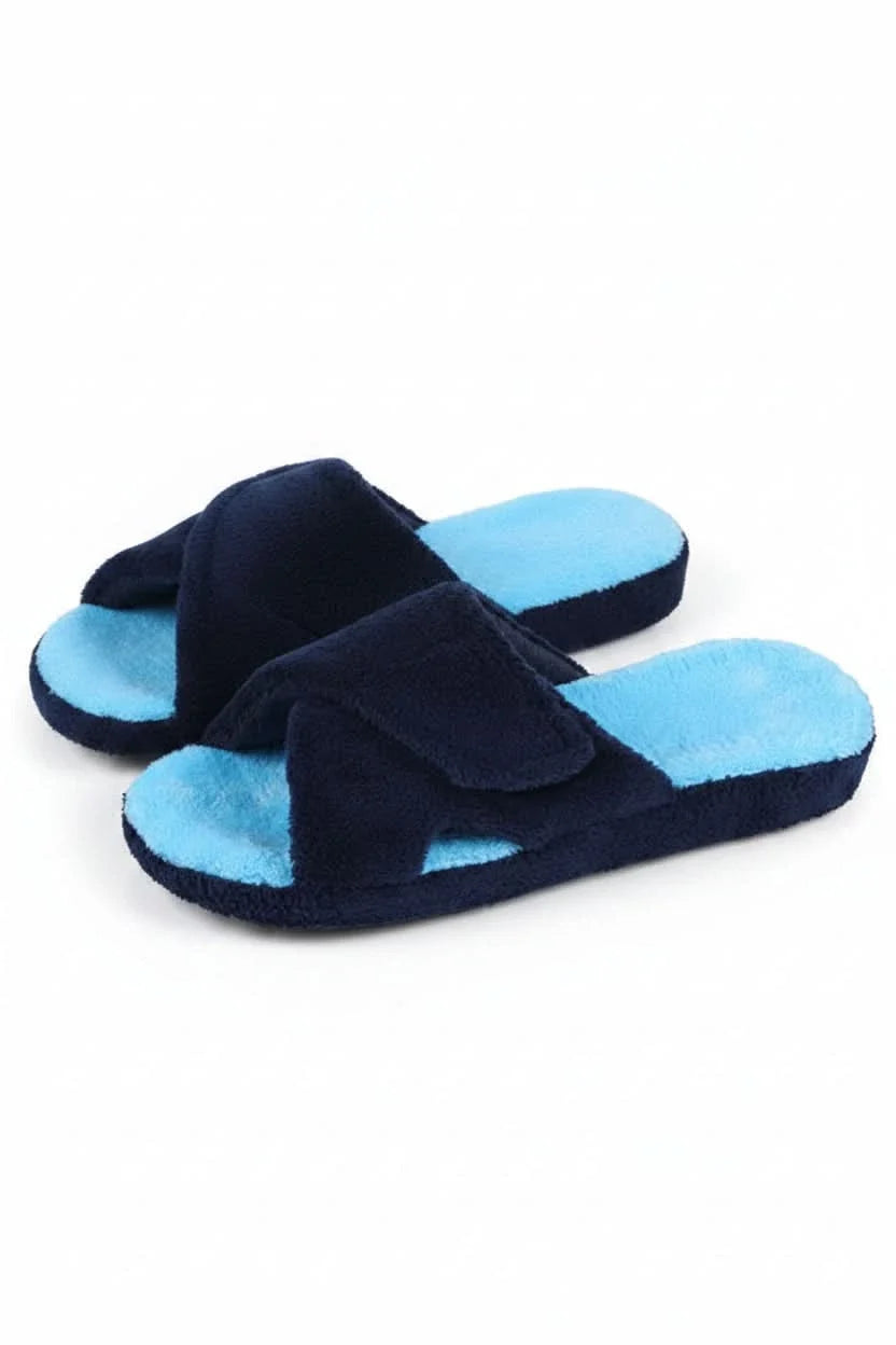 Woman wearing adjustable open toe comfort slippers, perfect for relaxing at home with cushioned support.