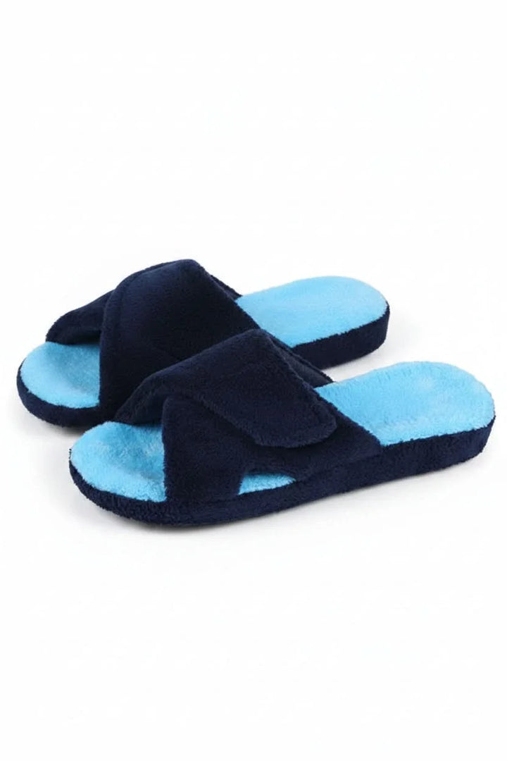 Woman wearing adjustable open toe comfort slippers, perfect for relaxing at home with cushioned support.