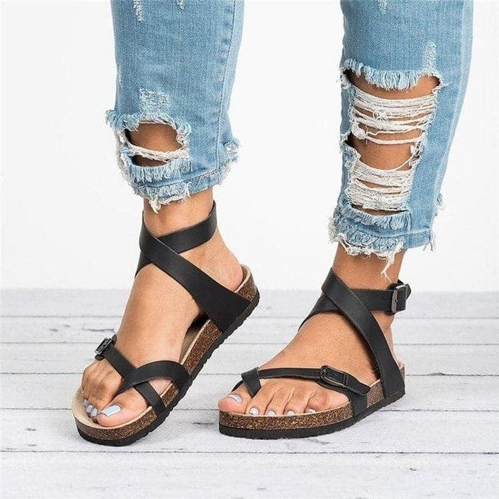 Casual women's flat strappy sandals with adjustable buckles, open toe design for summer style & comfort.