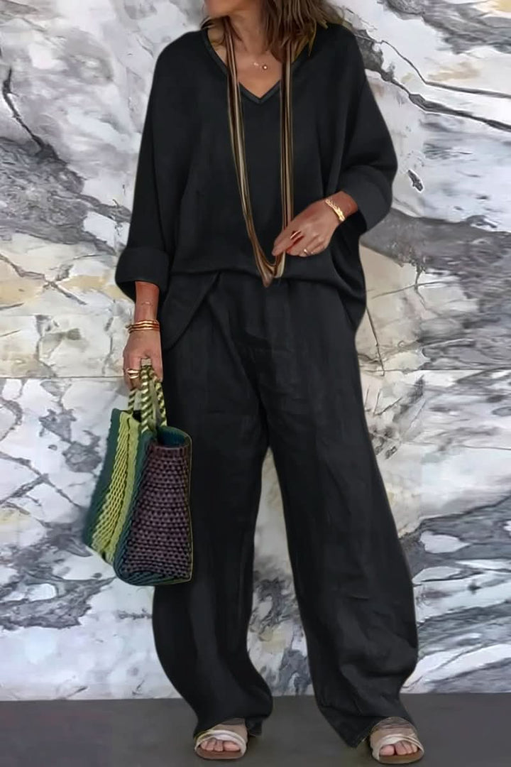 Women's airy open back pantsuit set, perfect for summer. Relaxed fit, stylish and comfortable two-piece travel wear.
