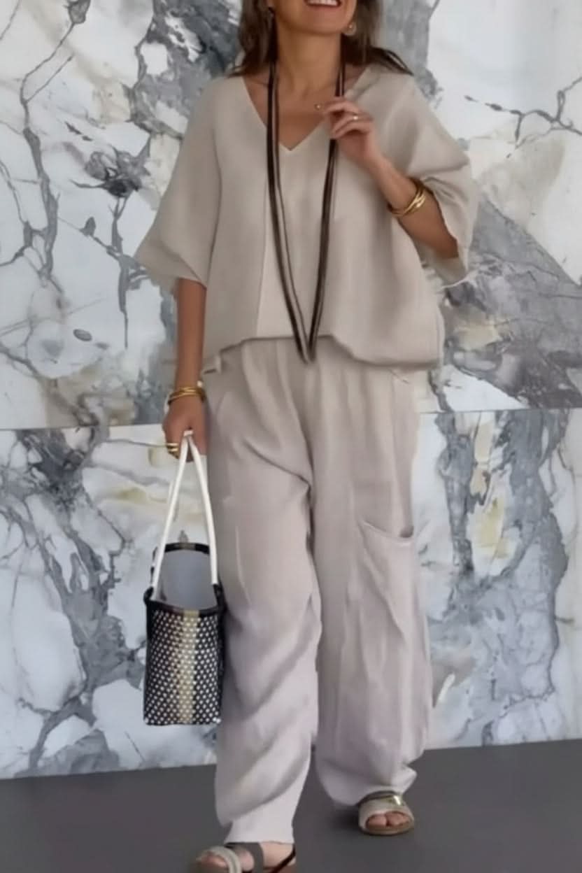 Chic women's open back pantsuit for a casual elegant summer look. Versatile two-piece set, ideal for lounge or travel.