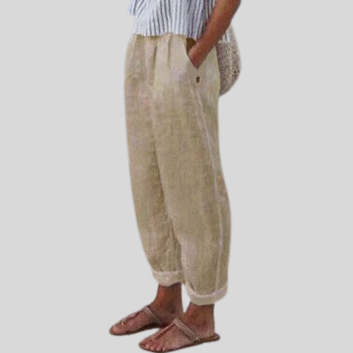 Women's airy relaxed fit trousers with a stylish folded hem, perfect for casual summer wear and comfort.