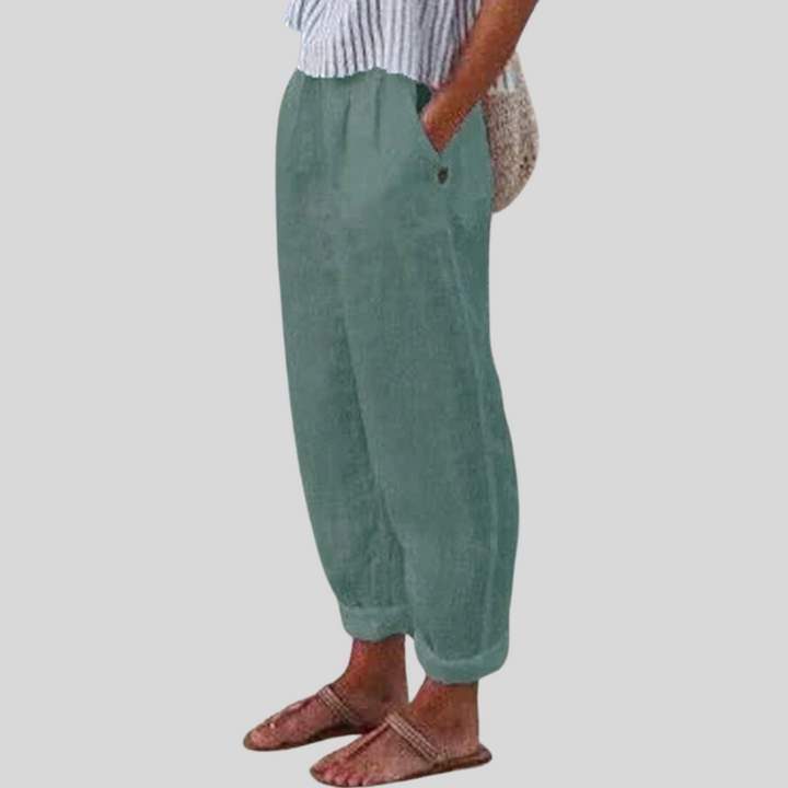 Lightweight women's trousers featuring a folded hem, designed for a relaxed fit and airy summer comfort.