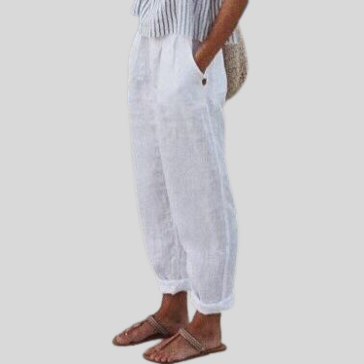 Fashionable women's folded hem trousers, airy & relaxed fit for versatile warm weather and casual elegance.