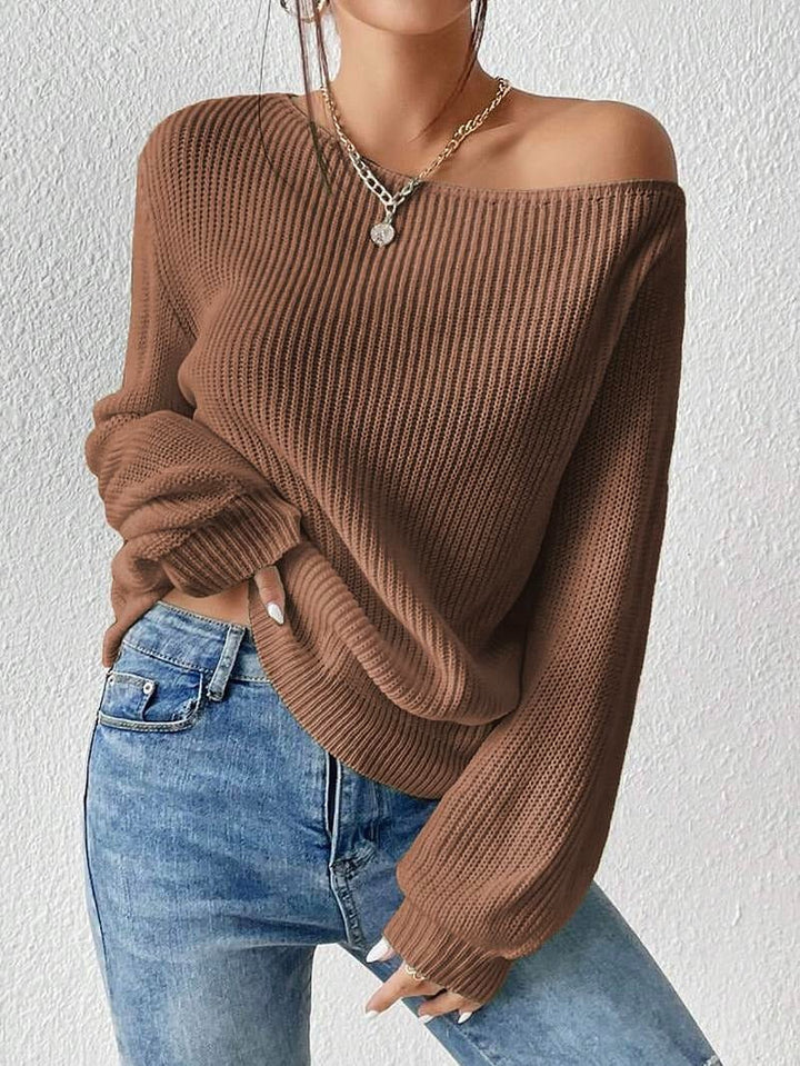 Women's Amalfi ribbed off-shoulder knit top, elegant long sleeve design for stylish comfort.