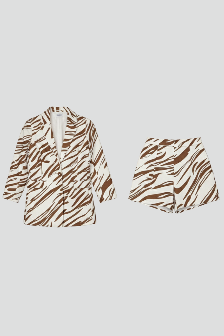 Casual yet chic women's animal print co-ord set. Perfect matching two-piece for a fashionable spring day.