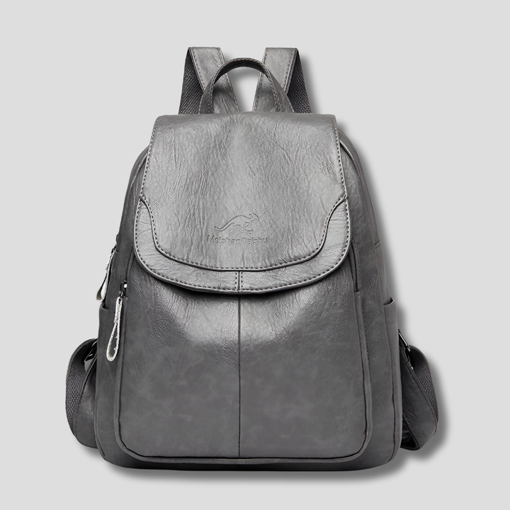 Women's secure anti-theft backpack, featuring a fashionable flap design for enhanced safety & style.