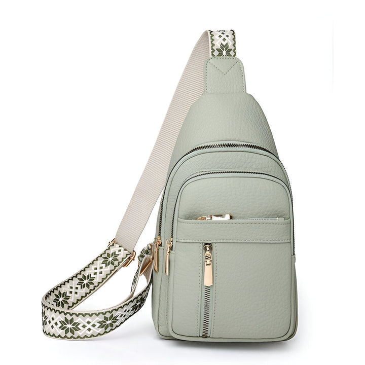 Anti-theft women's sling backpack, a versatile crossbody travel bag with RFID protection & a chic decorative strap.