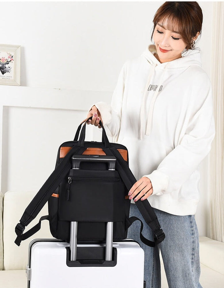 Secure & lightweight women's travel backpack, anti-theft design with durable oxford fabric.