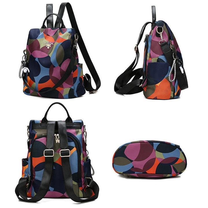 Black anti-theft women's travel backpack, water-resistant, with hidden zippers for secure daily carry.