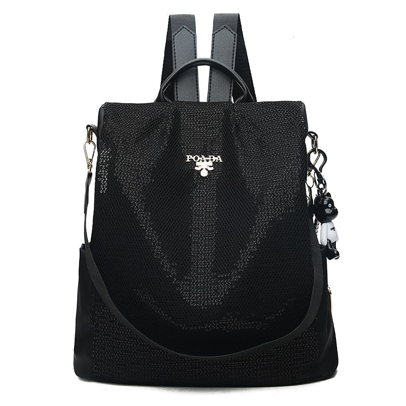 Fashionable women's travel backpack, water-resistant design, perfect for organized daily commutes & secure trips.