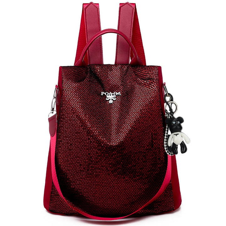 Secure anti-theft backpack for women. Water-resistant travel bag with padded laptop sleeve for daily essentials.