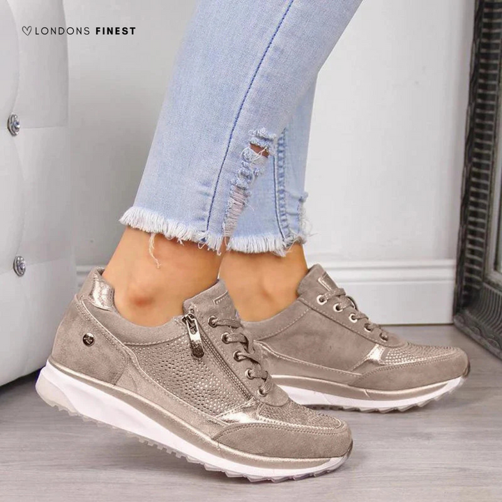 Lightweight women's sneakers featuring arch support & cushioned insole, perfect for comfortable everyday walking.