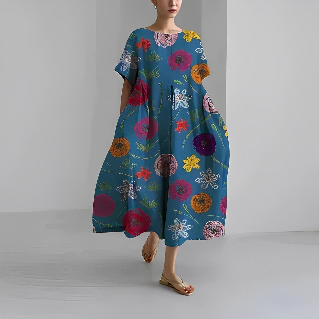 Stylish women's relaxed midi dress, artistic print. A versatile round neck summer dress for casual or vacation looks.