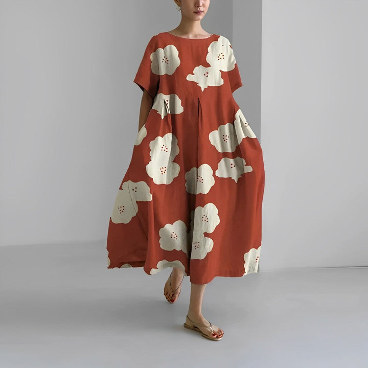 Everyday women's relaxed midi dress with a unique artistic print. Short sleeve, round neck comfort for daily style.