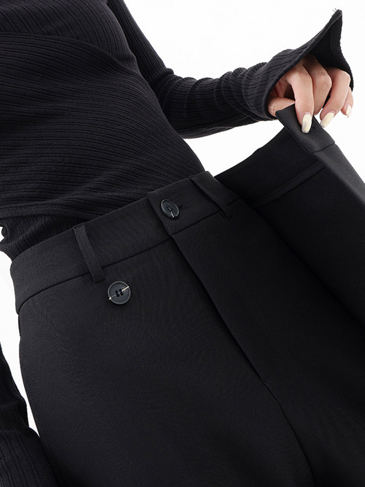 Versatile women's asymmetric baggy trousers with a relaxed fit, ideal for modern stylish casual outfits.