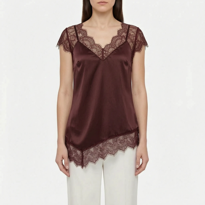 Beige asymmetrical women's top, elegant & sleeveless with subtle sheer details. Versatile summer blouse.
