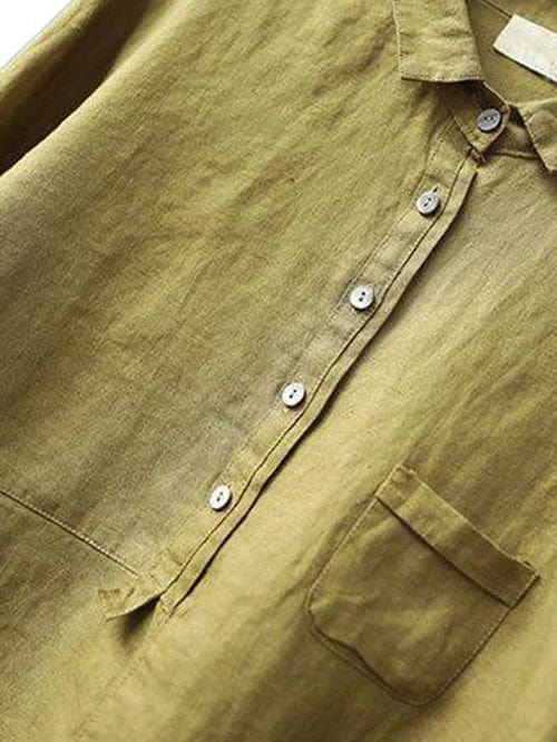 Elegant women's long sleeve asymmetrical shirt, a comfortable relaxed fit button up top.
