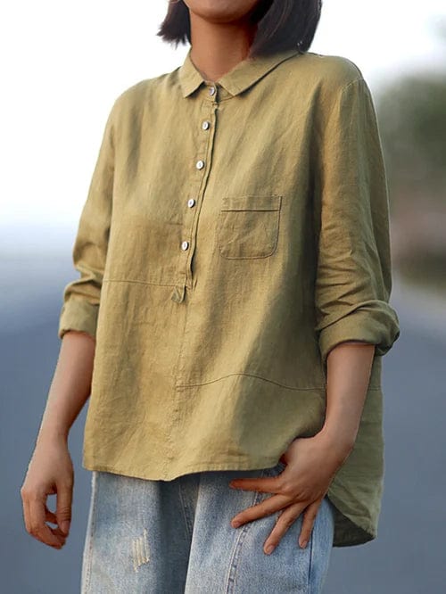 Modern women's asymmetrical hem blouse, button-up style for a chic and effortless look.