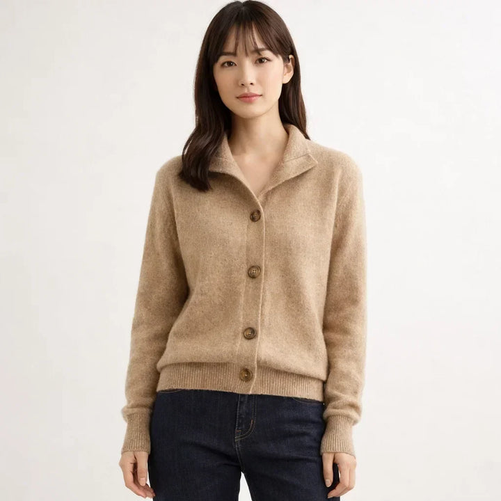 Relaxed fit women's asymmetrical button placket cardigan. Elegant high-neck knit for daily wear.