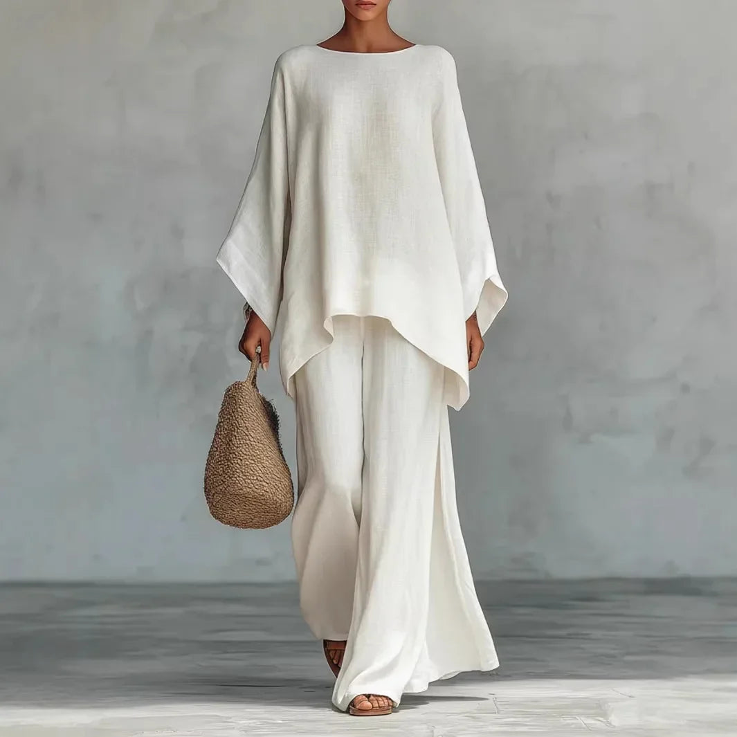 Women's asymmetrical two-piece set with chic wide-leg pants. Perfect for versatile spring & summer fashion.