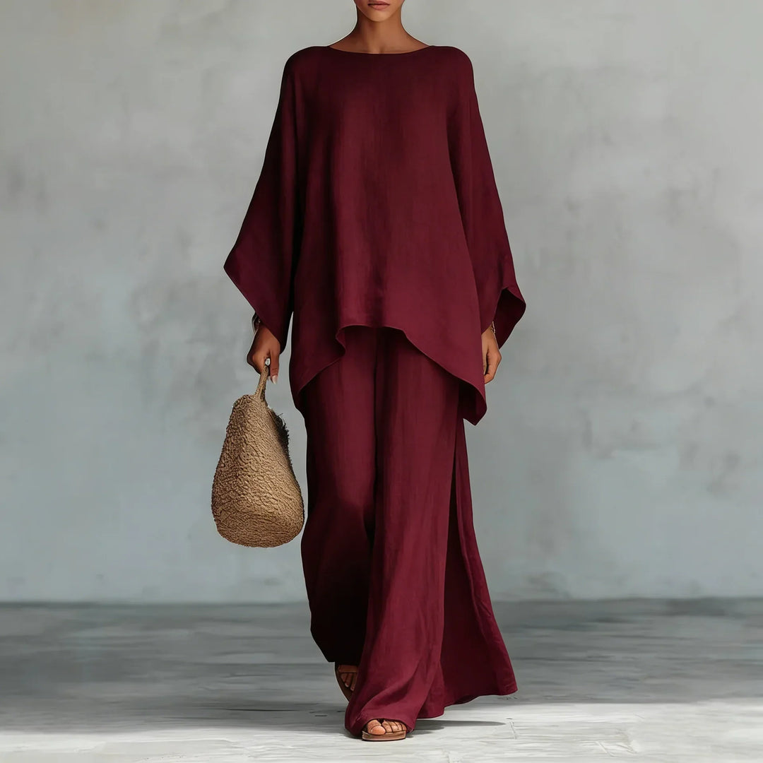 Versatile women's two-piece set: asymmetrical top & wide-leg pants, ideal for casual wear, lounge, or summer fashion.