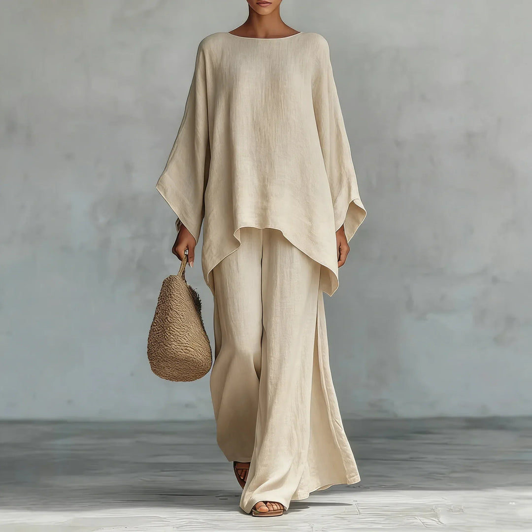 Stylish women's asymmetrical top paired with comfortable wide-leg pants. A perfect two-piece set for spring fashion.
