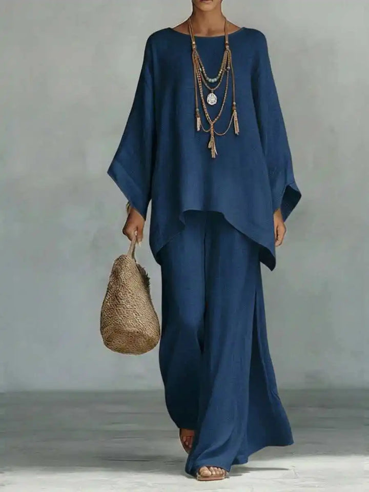 Trendy women's asymmetrical two-piece set with comfortable wide-leg pants. A chic and versatile addition to your wardrobe.