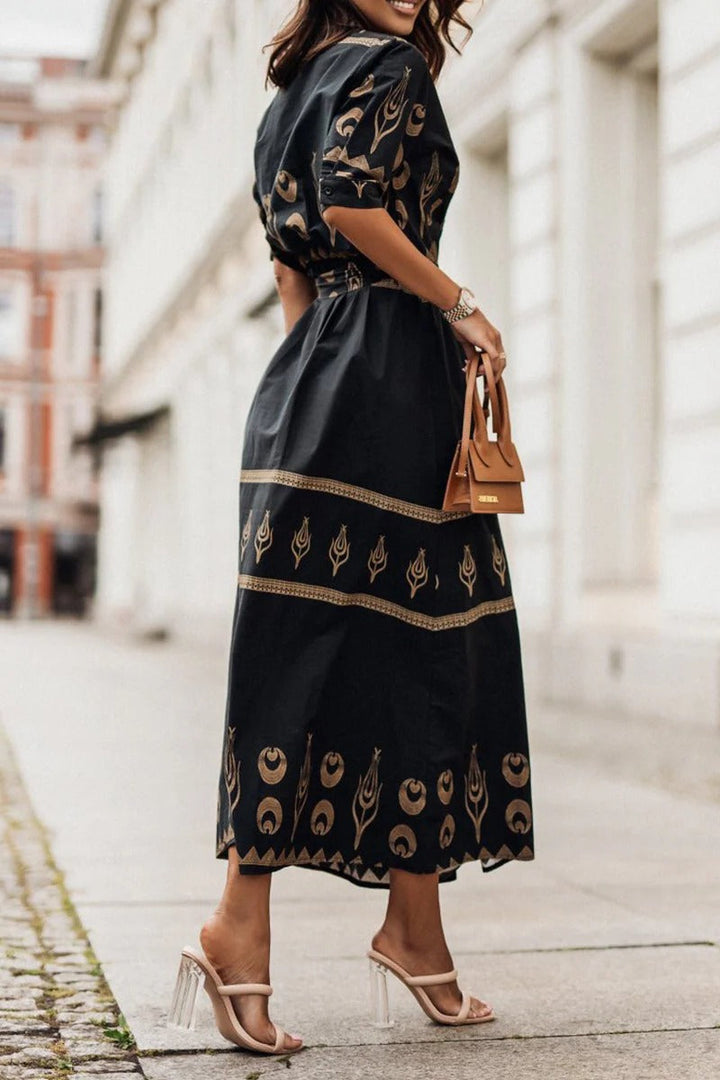 Stylish women's Aztec print midi dress. Button-down, belted & flared design offers a unique, versatile look.