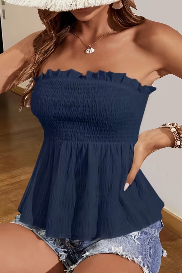 Sleeveless backless tube top for women with a playful flared hem. Great for comfortable, stylish summer looks.