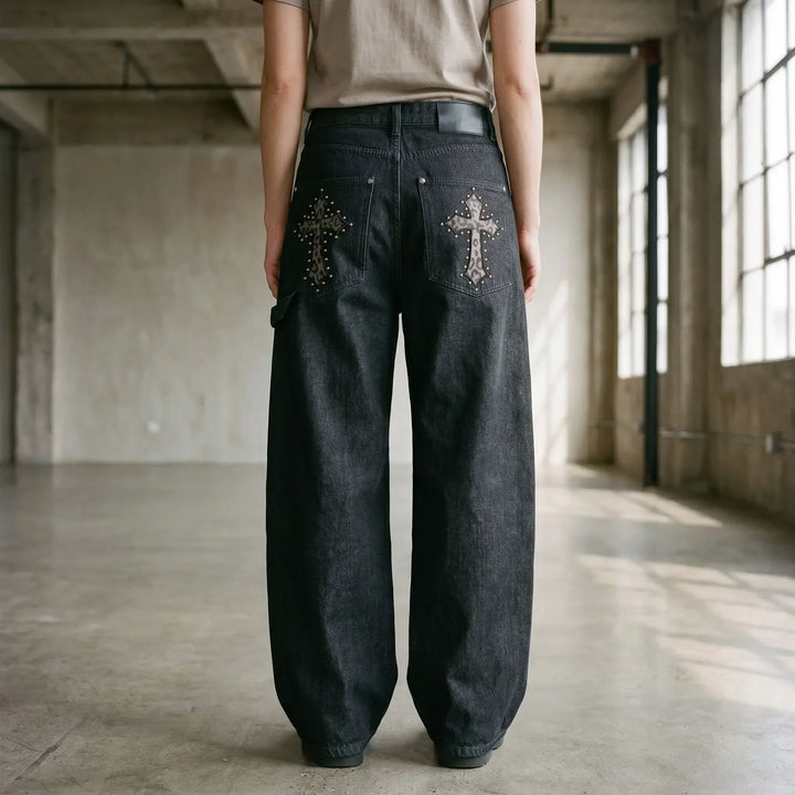 Women's baggy wide-leg pants featuring a unique studded cross design, ideal for streetwear & grunge fashion.