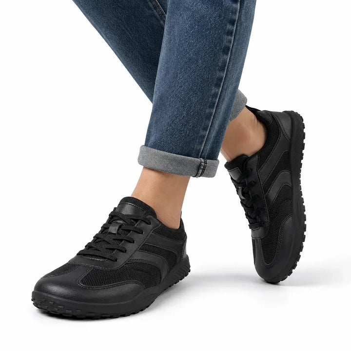 Non-slip women's comfort trainers, flexible barefoot design for natural walking.