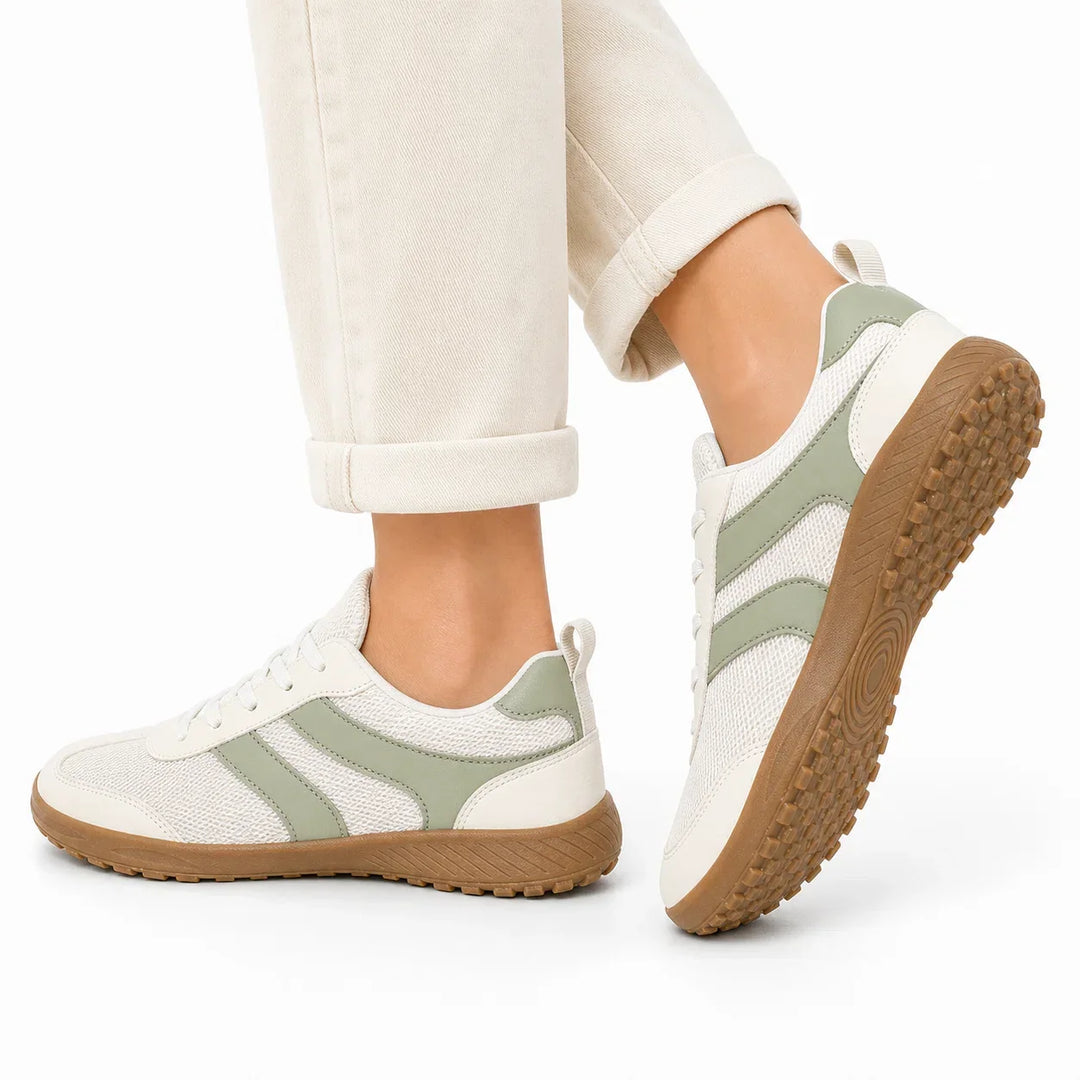 Lightweight women's barefoot walking shoes, flexible and supportive for natural movement.